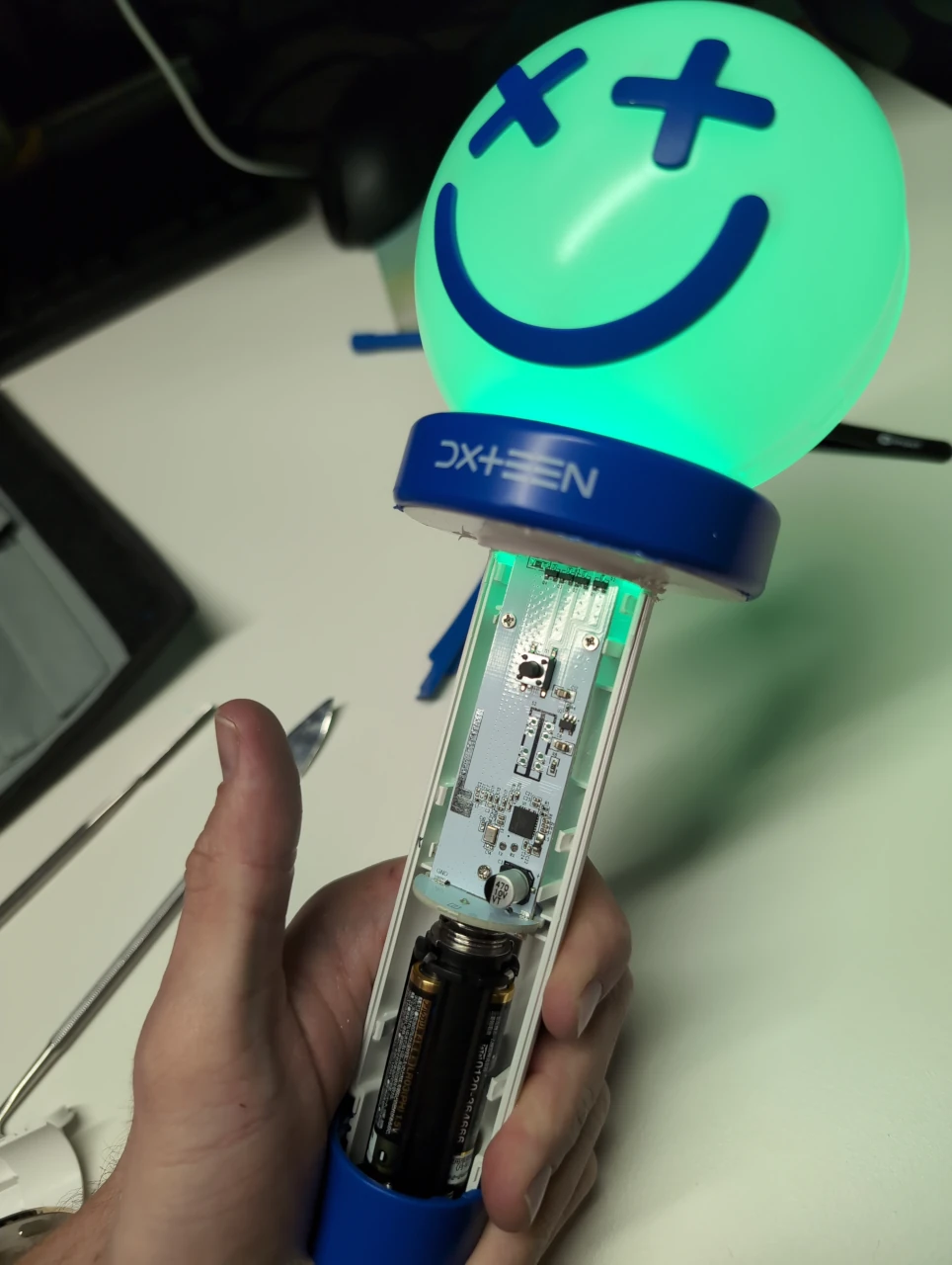 Pen light with the front plastic cover removed, PCB exposed